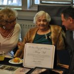 Assembly Majority Leader Joe Morelle visits with Mary Vill and her family